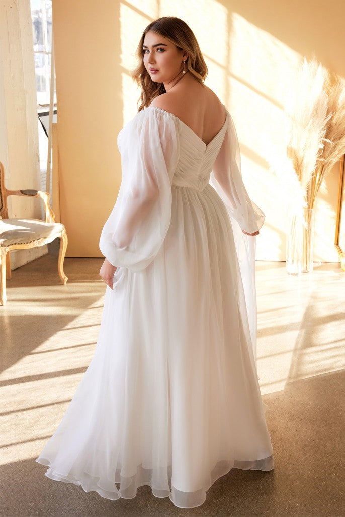 The diaphanous gown features a romantic sweetheart neckline with intricate pleating throughout framed by billowing sheer blouson sleeves that can be worn on or off the shoulder. The frothy A-line skirt is gathered at the waist and flows to a gently pooling hem. Long Sleeve Chiffon Gown (No Stretch) Sweetheart bodice with billowy sleeves Open back Floor length A-line skirt with a small train Details: Bra Cup, Fully Lined Fit: The model is 5'8" and is wearing 4" heels