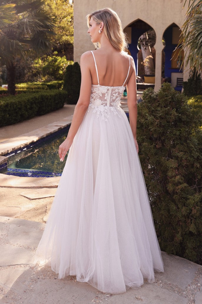 Bring your fairytale wedding to life in this dreamy a-line bridal gown. Cut from layers of luxe tulle this dress features beaded lace appliques and a deep v-neckline. A sheer lace back covers to the mid back. Designer: Cinderellla Divine Material: Tulle Back zipper Fully lined Soft cup inserts