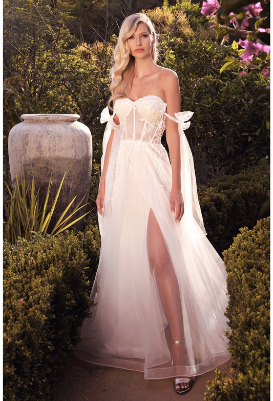Walk down the aisle in this truly breathtaking bridal gown. Fitted in the bodice a structured corset accentuates modern bust lines. Lace appliques detail the neckline and trickle down the waist. The side seam details a sheer lace with a tulle criss cross strap shaping out to a lace up open back. An A-line silhouette flows out from the waist in layers of luxe tulle and horsehair braid hem.
