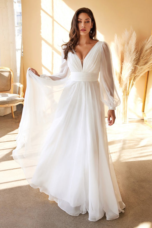 This dreamy chiffon gown features a layered a-line skirt gathered at the waist. Sheer long sleeves drape the arms up to the gathered deep v-neckline bodice and ruched waistband. The back has a mid-opening allowing for bra strap coverage.