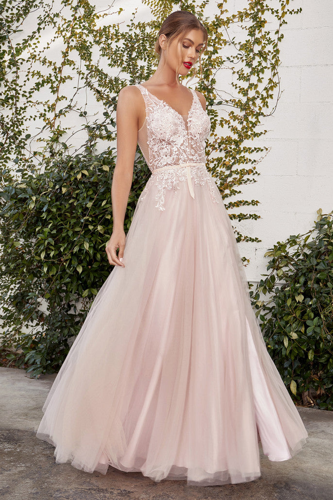 The harmony of soft tulle and floral lace come together in three soft, nude hues of different personalities. The lace is decorated with matching-hue rosegold crystals, strategically placed on the bodice and skirt to flatter your figure. The dress is designed with a v-neckline and mid-V back, and the waistline is accented with an adorable velvet ribbon.
