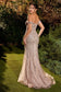 Step into the spotlight with this breathtaking off-the-shoulder gown, a symphony of romance and glamour. The nude hue, adorned with linear silver crystal beading, creates an ethereal canvas that shimmers with every movement. The deep sweetheart neckline adds a touch of allure, framing your silhouette with timeless elegance. Delicate lace appliqué weaves a story of enchantment, ensuring you dazzle with every step. This fitted masterpiece is not just a gown; it's a love letter to sophistication and style