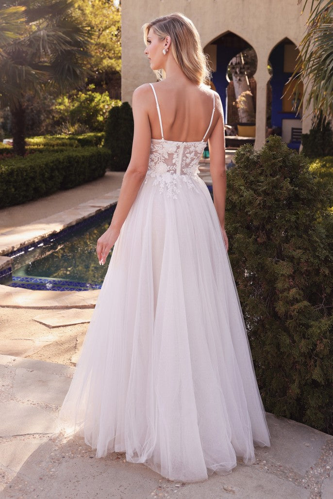 Bring your fairytale wedding to life in this dreamy a-line bridal gown. Cut from layers of luxe tulle this dress features beaded lace appliques and a deep v-neckline. A sheer lace back covers to the mid back.  Designer: Cinderellla Divine Material: Tulle Back zipper Fully lined Soft cup inserts