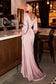 Smooth satin ensures the fluid drape of this elegant dress. The bodice features a wrap effect fashioned with pleats that cinch and sculpt your frame before falling to a romantic cascading drape and pooling floor-length hem. A front split is revealed flashing just the right amount of leg as you walk. The long blouson sleeves are finished with flowing cuff fastening ties.