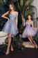 This A-line mini dress features an embellished bodice with floral motif lace appliqué and an elegant v-neckline that highlights your décolletage. The narrow straps are trimmed with ruffled tulle. The gathered and layered tulle skirt kicks out from the natural waist.  Embellished bodice V- neckline Floral motif lace applique A-line  Garment Care: Dry Clean Suggested 