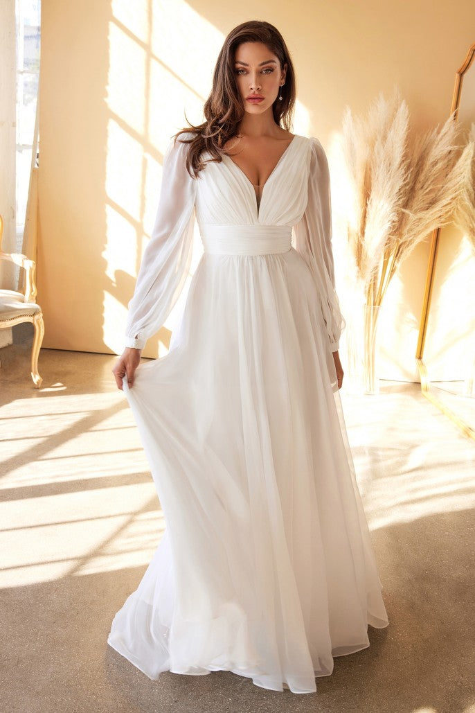 This dreamy chiffon gown features a layered a-line skirt gathered at the waist. Sheer long sleeves drape the arms up to the gathered deep v-neckline bodice and ruched waistband. The back has a mid-opening allowing for bra strap coverage.