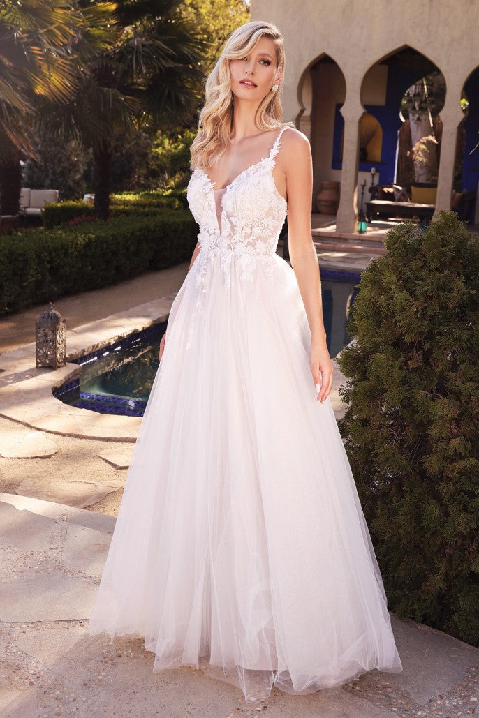 Bring your fairytale wedding to life in this dreamy a-line bridal gown. Cut from layers of luxe tulle this dress features beaded lace appliques and a deep v-neckline. A sheer lace back covers to the mid back.  Designer: Cinderellla Divine Material: Tulle Back zipper Fully lined Soft cup inserts