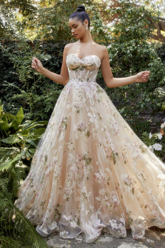 Step into a beautiful fairy tale garden when you slip into this ravishing magnolia print strapless a-line gown. The sheer boned bodice and sweetheart neckline are divinely crafted to add delicate femininity to your look. The lightweight organza fabric of this dress is adorned with an enchanting magnolia print. This ultra-romantic silhouette will ensure all eyes are on you as you make your way through the party or down the aisle! Enchant everyone with exquisite beauty in this gorgeous gown.