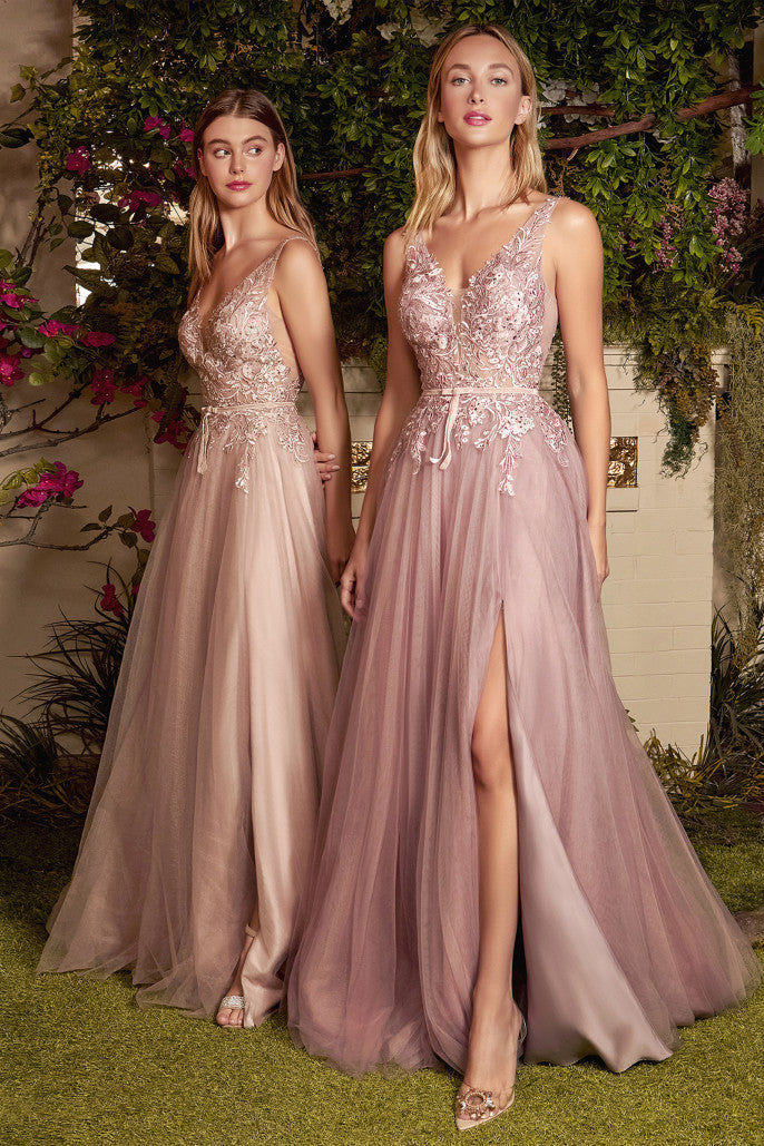 The harmony of soft tulle and floral lace come together in three soft, nude hues of different personalities. The lace is decorated with matching-hue rosegold crystals, strategically placed on the bodice and skirt to flatter your figure. The dress is designed with a v-neckline and mid-V back, and the waistline is accented with an adorable velvet ribbon.