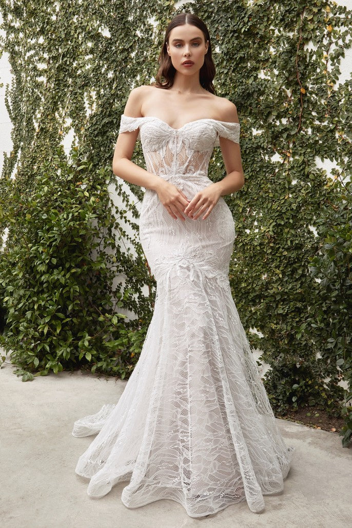 Jolie Gown is everything a bride could want: Beautiful lace placement that falls flatteringly on the body, perfect mermaid silhouette, and comfortable stretch. Off shoulder lace flap provides elegant cover to the arms while showcasing a beautiful neckline. There is no compromise in the beauty of the gown, as this dress makes perfect hourglass of the wearer.
