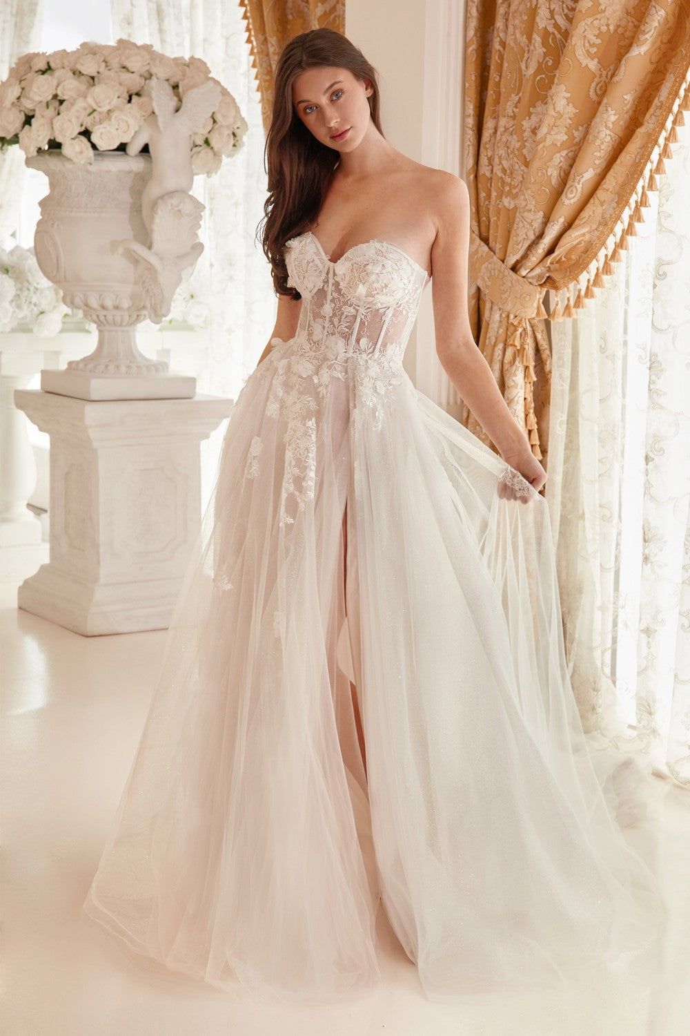 You'll capture your guest's attention in this 3D floral applique long strapless off white dress with A-line slit skirt by Andrea & Leo A1089W. This beautiful gown features a strapless sweetheart bodice with sheer corset boning, open back, and a floor length A-line skirt that ends in a sweep train.