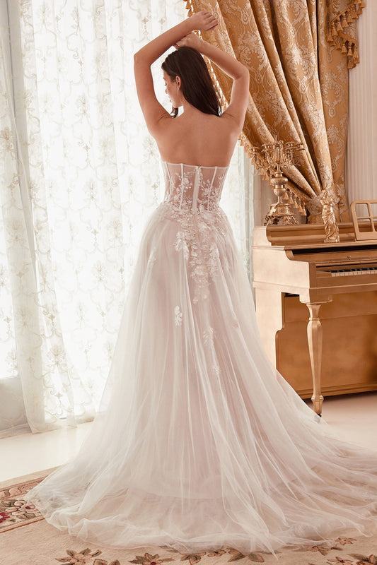 You'll capture your guest's attention in this 3D floral applique long strapless off white dress with A-line slit skirt by Andrea & Leo A1089W. This beautiful gown features a strapless sweetheart bodice with sheer corset boning, open back, and a floor length A-line skirt that ends in a sweep train.