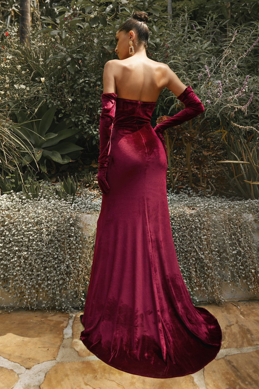 A vintage take on classic glamour, Ch176 captures the feel of old Hollywood with the refreshing energy of the modern era. This luxe design features a corset-inspired bodice with a mermaid skirt in velvet fabrication. Adorned with jewel tones, it comes with detachable gloves for a versatile and dramatic appeal.