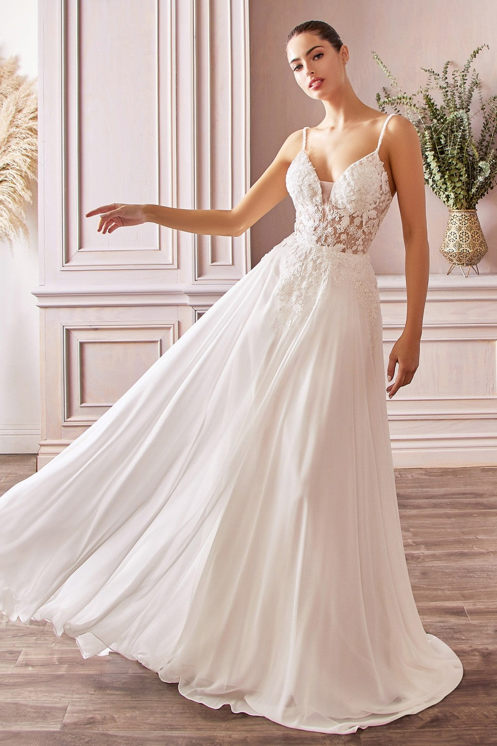 This feminine silhouette is captured and defined by a delicately embroidered and beaded bodice and sweeping satin A-line skirt. The gown features a sheer tulle bodice with internal boning that hugs your figure to ensure a supportive and comfortable fit, illusion mesh at the v-neckline and narrow embellished straps.